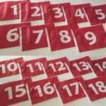 GROMMETS NUMBERED GOLF FLAGS -WHITE TEXT ON RED